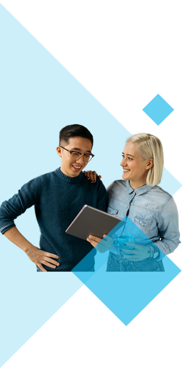 Two people, one holding a tablet and the other with an arm around them, smile at each other. They stand against a geometric blue background.
